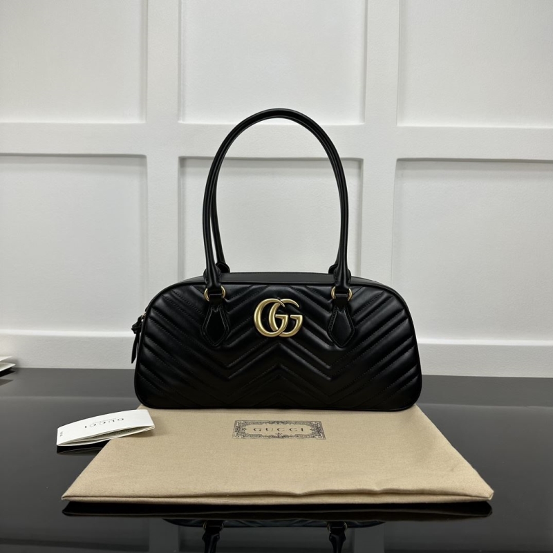 G*u*i top handle bags
